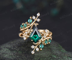 Kite cut emerald leaf engagement ring set twig nature inspired 14k yellow gold diamond enhancer wedding band bridal set
