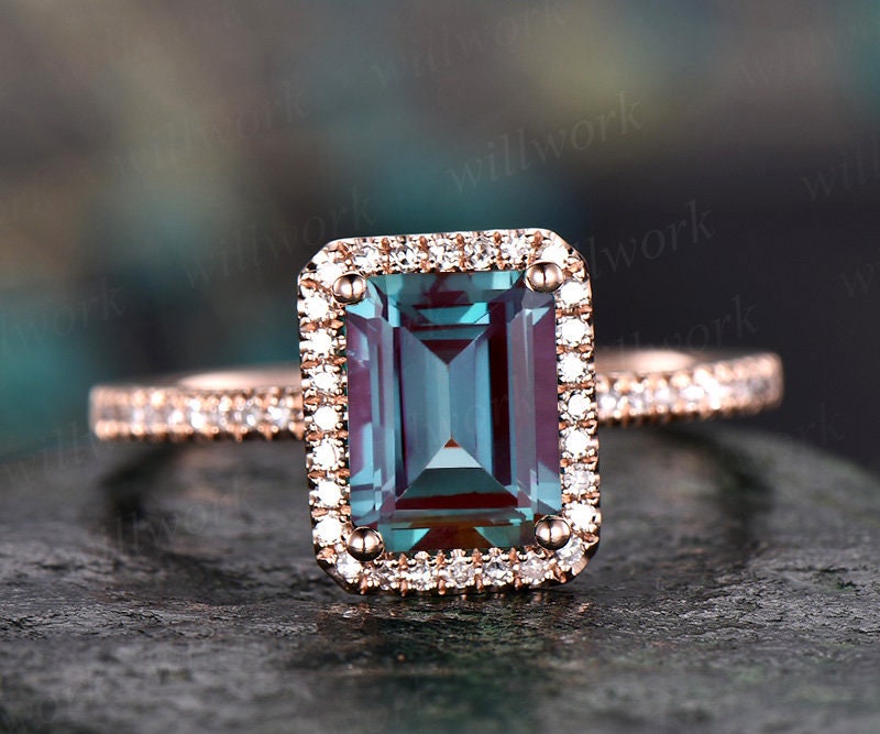 Emerald cut diamond engagement ring in rose gold