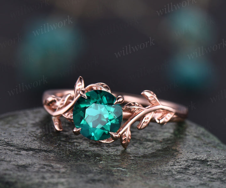 rose gold emerald engagement ring
