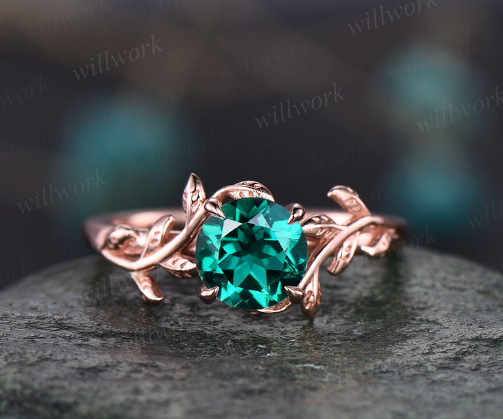 leaf emerald engagement ring