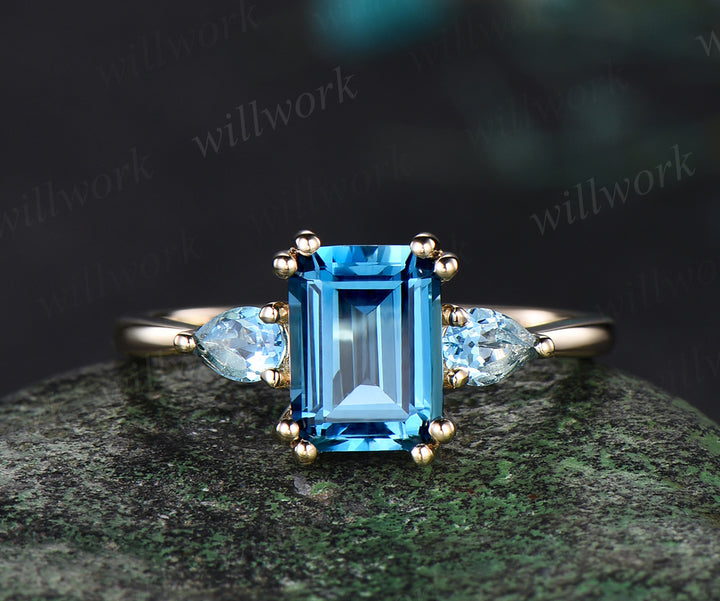 Emerald cut London blue topaz ring Minimalist yellow gold three stone Swiss blue topaz wedding ring women unique engagement ring 8 prong gift