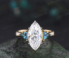 Marquise lab grown diamond engagement ring three stone trillion cut London blue topaz tapered band unique bridal ring