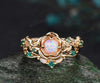 Vintage round cut opal engagement ring set yellow gold flower floral leaf twisted five stone ring curved emerald band bridal set