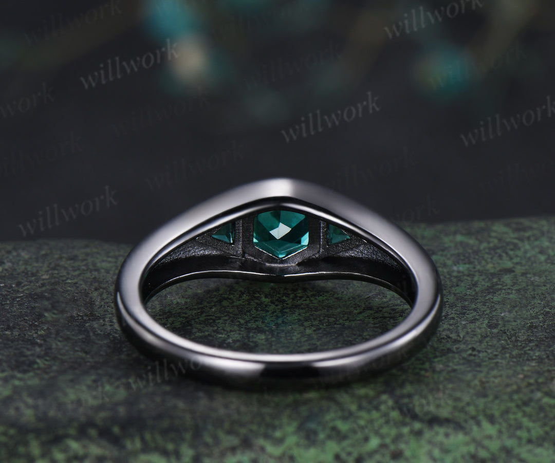 Hexagon cut emerald engagement ring black gold three stone flush setting with trillion emeralds modern ring