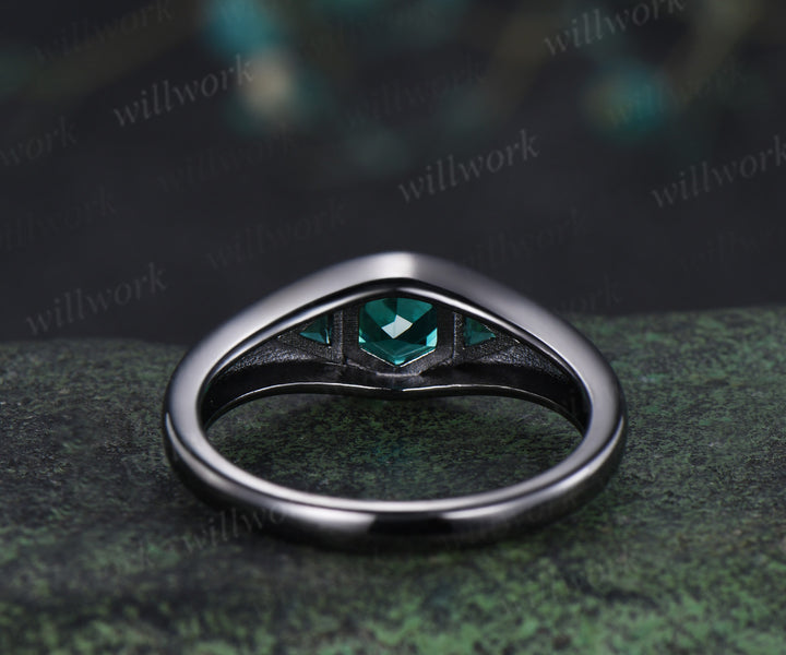 Hexagon cut emerald engagement ring black gold three stone flush setting with trillion emeralds modern ring