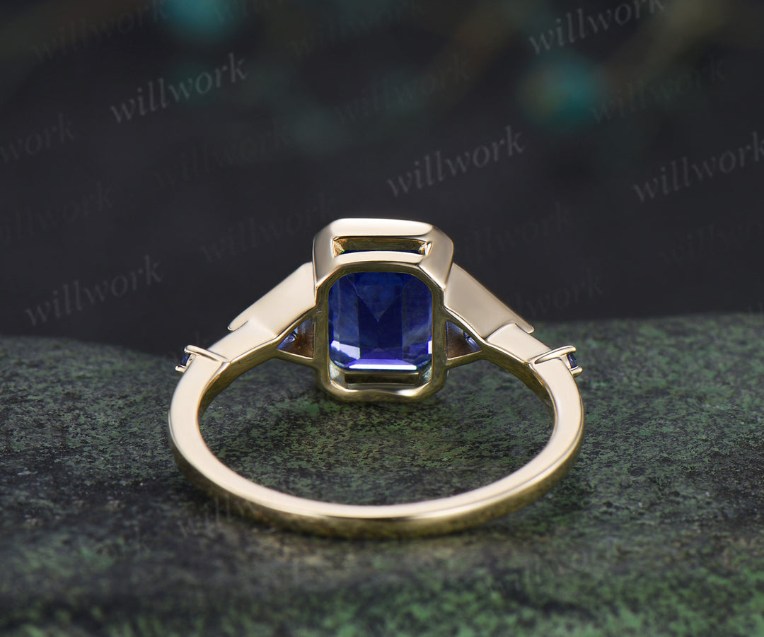 Emerald cut sapphire ring trilliant cut sapphire bezel engagement ring unique five stone ring for women