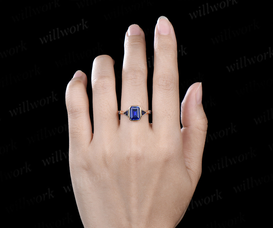Emerald cut sapphire ring trilliant cut sapphire bezel engagement ring unique five stone ring for women