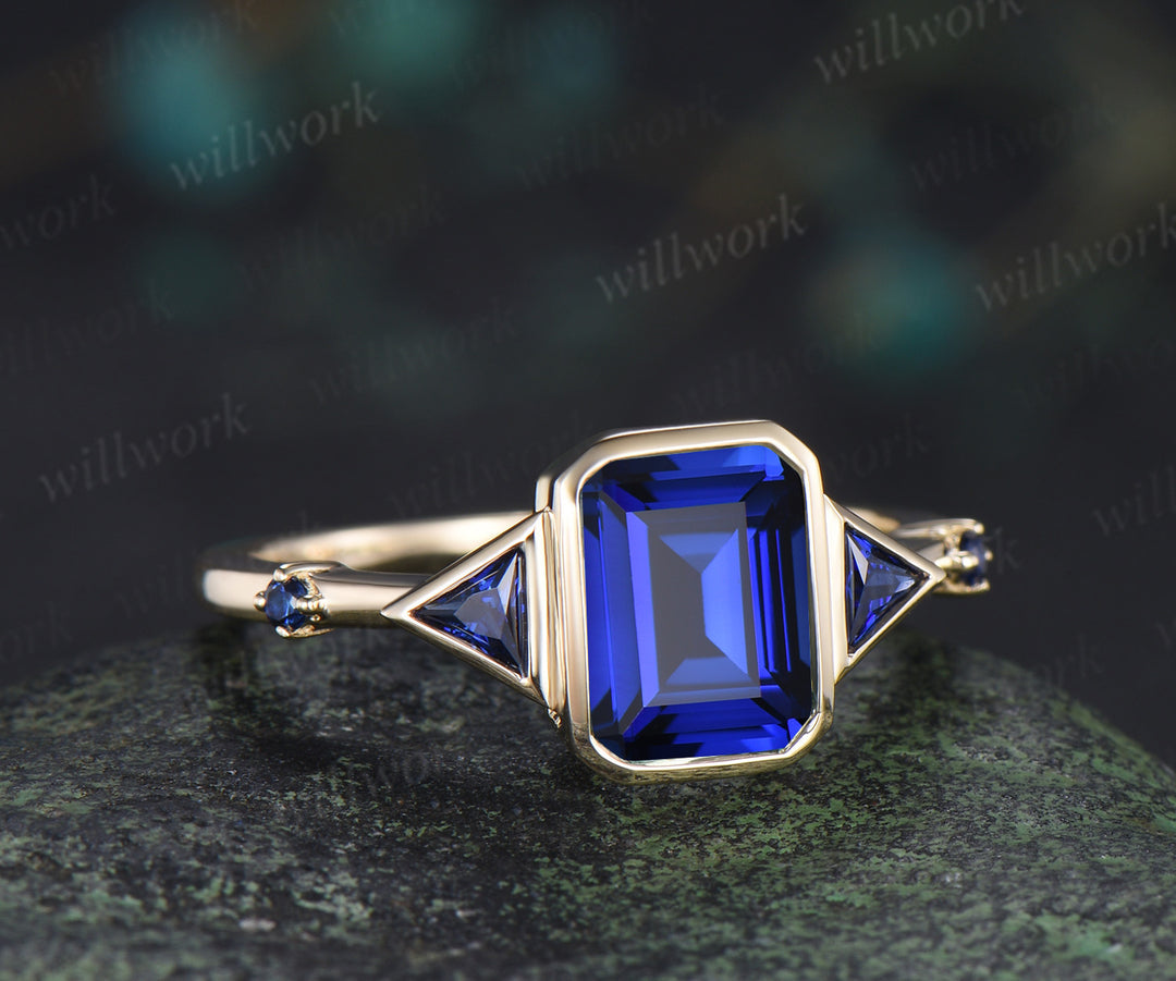 Emerald cut sapphire ring trilliant cut sapphire bezel engagement ring unique five stone ring for women