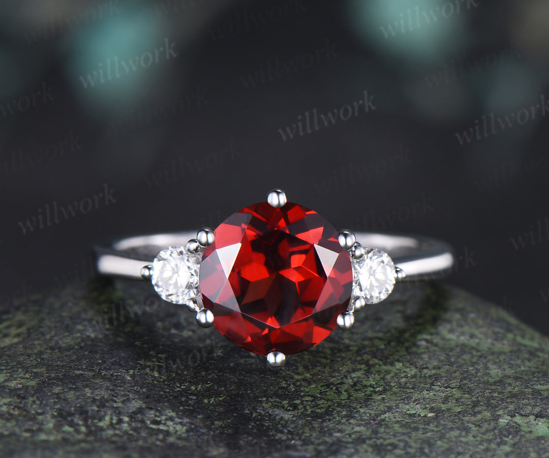 Round Cut Garnet Engagement Ring Three Stone Moisanite Accent Promise Ring Curved Wedding Band Alternative Bridal Set