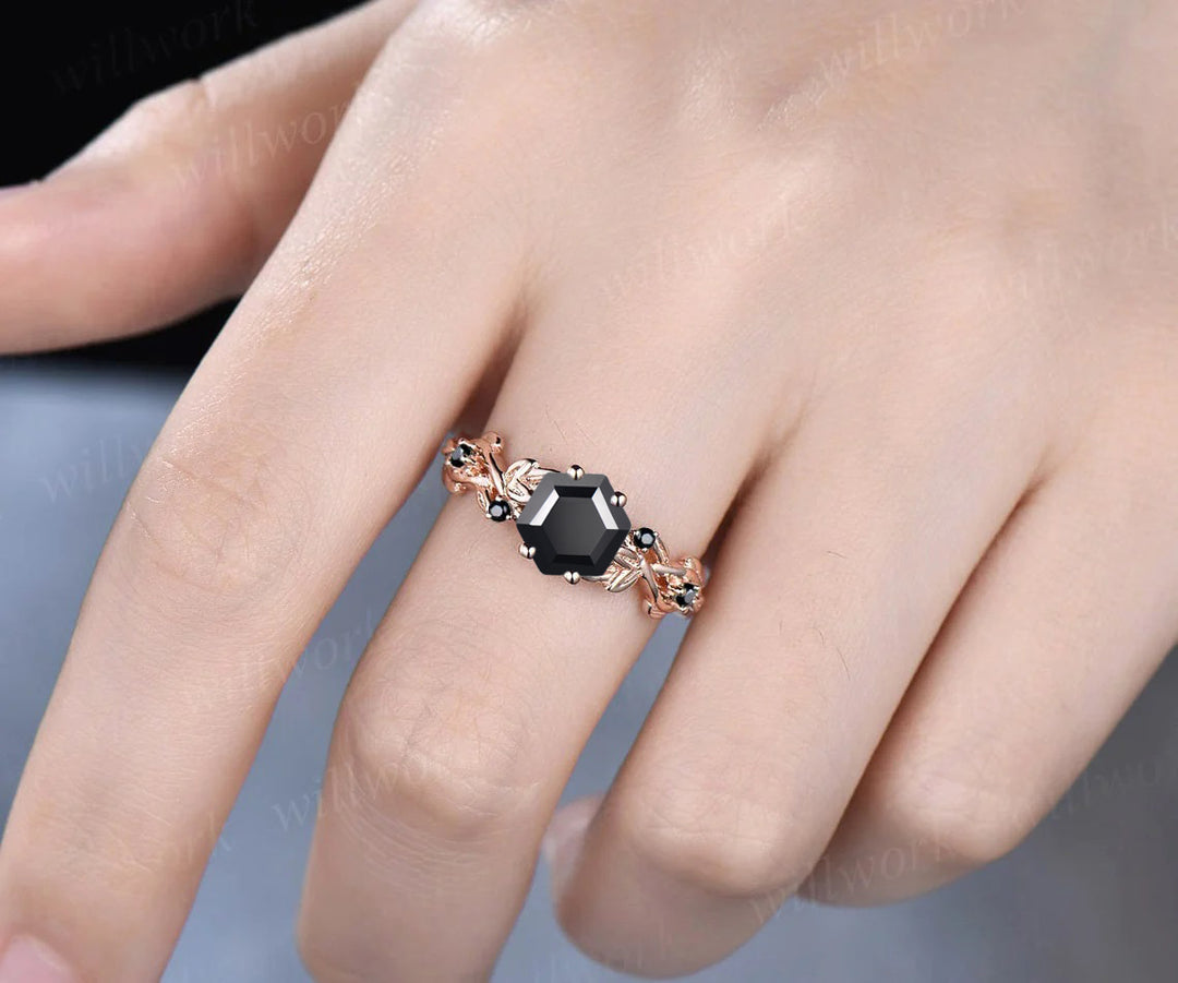 gold black diamond leaf and vine engagement ring