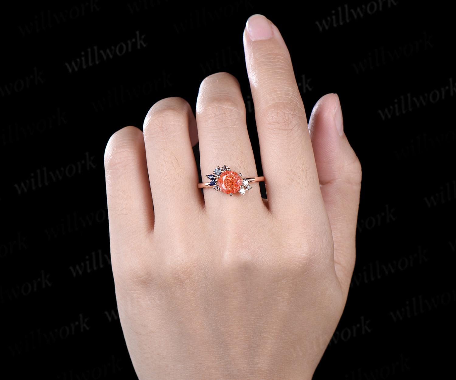 Round cut sunstone engagement ring rose gold cluster alexandrite