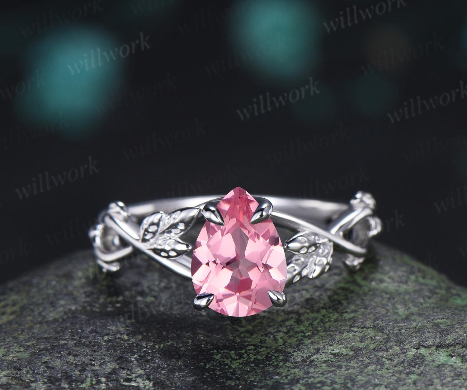 Pear shaped Padparadscha pink sapphire engagement ring vintage