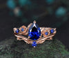 Pear shaped blue sapphire engagement ring set rose gold September birthstone leaf floral flower bridal ring set women