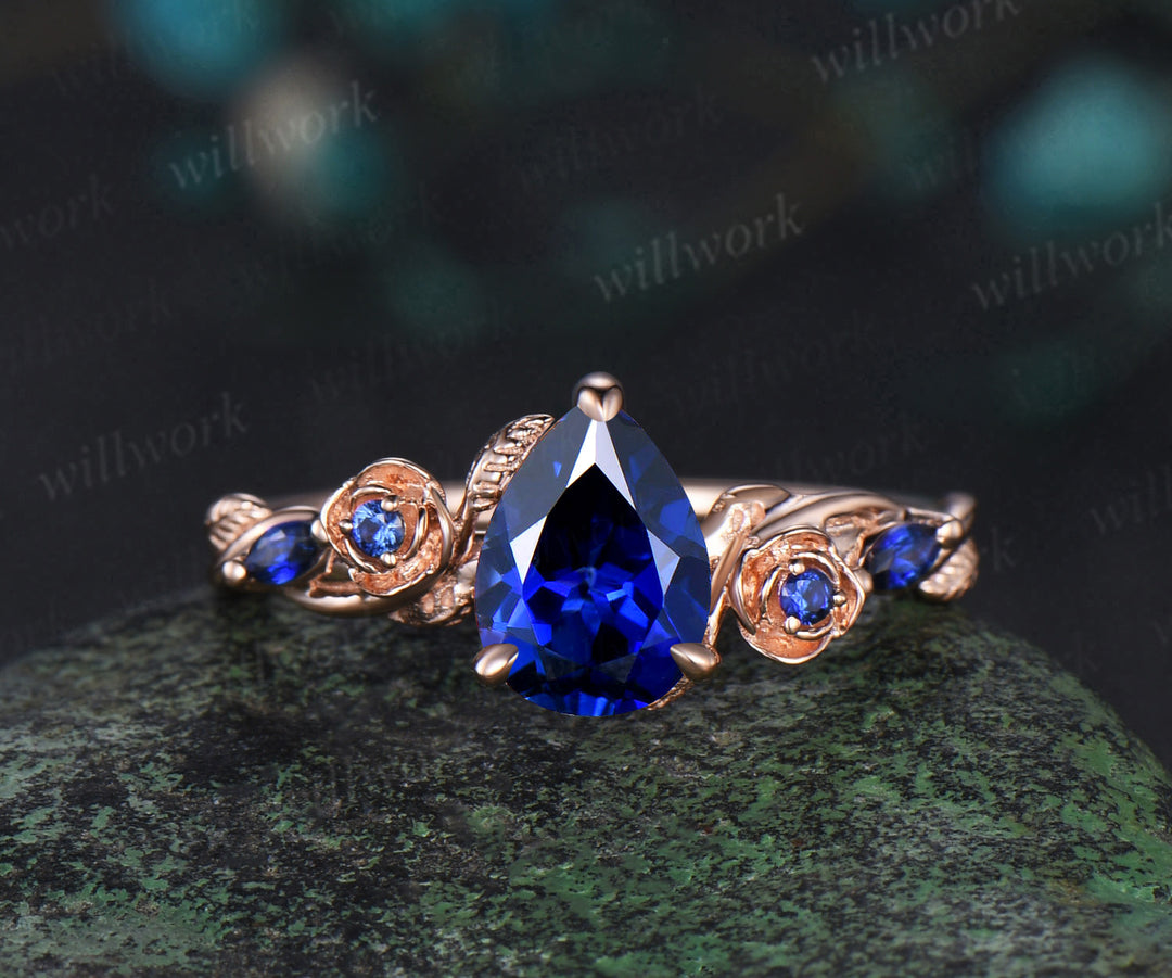 Pear shaped blue sapphire engagement ring set rose gold September birthstone leaf floral flower bridal ring set women