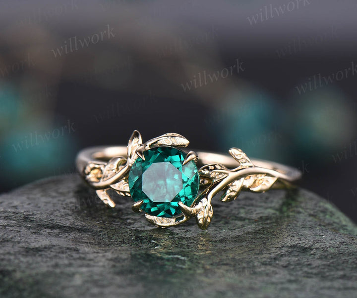 yellow gold emerald engagement ring